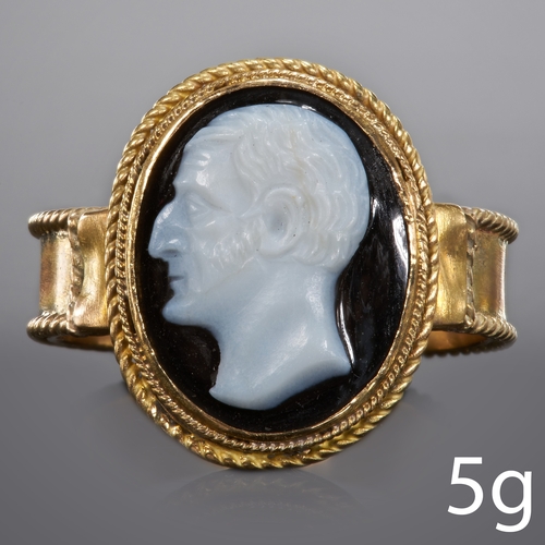 259 - RARE ANTIQUE HARD STONE CAMEO RING
5 grams, testing 14 ct. gold.
Carved hard stone cameo depicting a... 