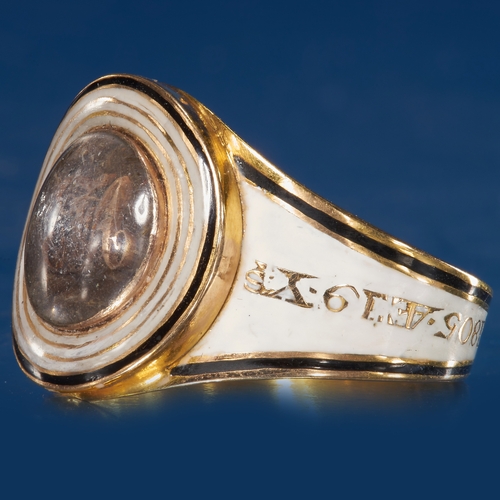 283 - RARE GEORGIAN ENAMEL MEMORI RING,
5.7 grams., testing 18 ct. gold.
Fine white and black enamel.
The ... 