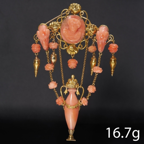 294 - RARE VICTORIAN CARVED CORAL BROOCH,
16.7 grams, testing as 18 ct. gold.
The coral carved with a came... 