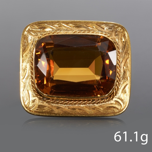 70 - LARGE CITRINE BROOCH,
16.1 grams, 15 ct. gold.
Rich and vibrant citrine of approx. 21 x 17.9 x 10.95... 