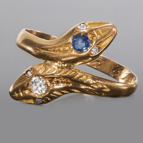 81 - SAPPHIRE AND DIAMOND DOUBLE SNAKE RING.
Set with vibrant sapphire and bright and lively diamond.
Siz... 