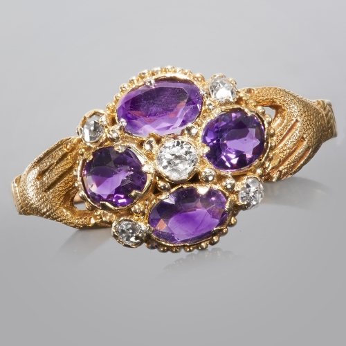 83 - FINE ANTIQUE AMETHYST AND DIAMOND HAND CLUSTER RING,
12 ct. gold.
Diamonds bright and lively.
Vibran... 