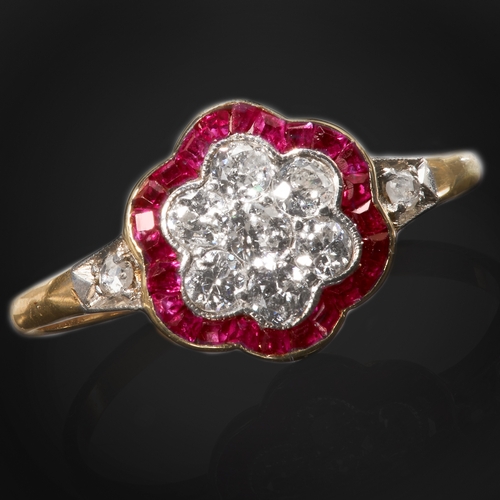 87 - DIAMOND AND RUBY CLUSTER RING.
2.1 gram. 18 ct. yellow gold.
Set with bright and lively diamond.
Vib... 