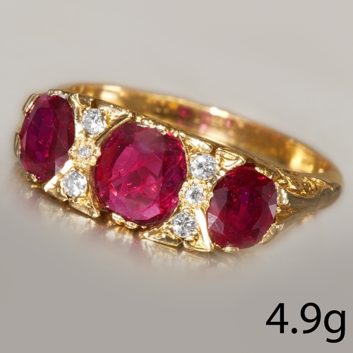 12 - RUBY AND DIAMOND 3-STONE RING,
High carat gold.
Rich and vibrant rubies
Diamonds bright and lively.
... 