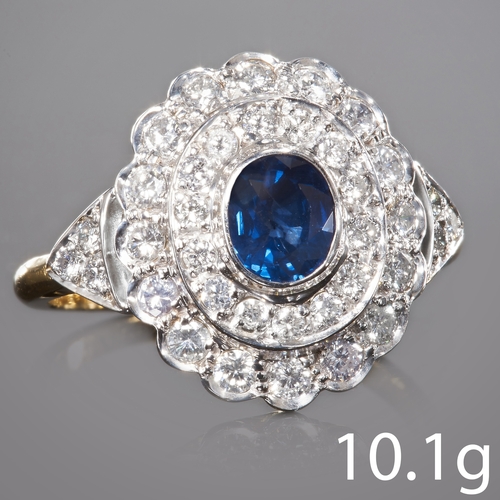 65 - SAPPHIRE AND DIAMOND CLUSTER RING, 
in 18 ct. gold. 
Vibrant blue sapphire of approx. 0.61 ct.
Diamo... 