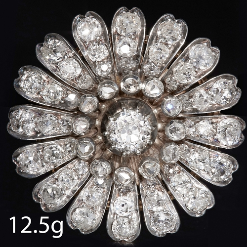 110 - ANTIQUE DIAMOND SET FLOWER BROOCH. 
Diamonds totalling approx. 4 ct.
Center diamond of approx. 0.55 ... 