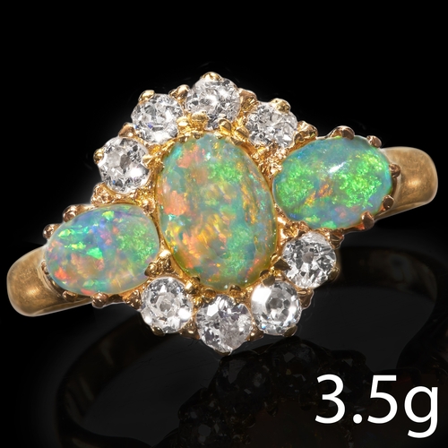 151 - OPAL AND DIAMOND CLUSTER RING,
3.5 grams, 18 ct. gold.
Vibrant opals with good play of colour.
Diamo... 