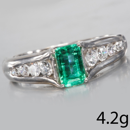 187 - EMERALD AND DIAMOND RING,
4.2 grams, testing 18 ct. gold.
Emerald ofg approx. 0.64 ct.
Diamonds on t... 