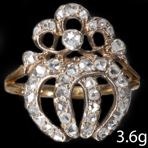 199 - ANTIQUE DIAMOND DOUBLE HORSE SHOE RING,
The 2 horse shoes topped with a bow.
Diamonds bright and liv... 