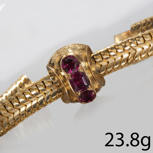 212 - VICTORIAN GARNET BRACELET. 
24 grams, high carat gold.
3 vibrant garnets to the center, well matched... 