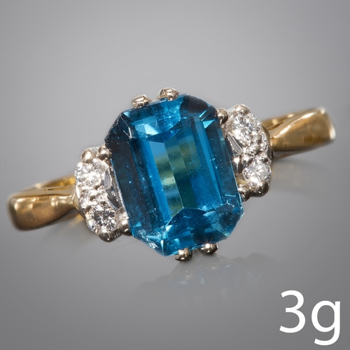 285 - TOPAZ AND DIAMOND RING,
3 grams, 18 ct. gold.
Vibrant blue topaz.
Diamonds bright and lively.
Size J... 