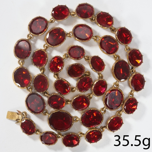 22 - GEORGIAN RIVIERE GOLD NECKLACE WITH RED STONES. 
35.5 grams.
set with foiled back vibrant red stones... 