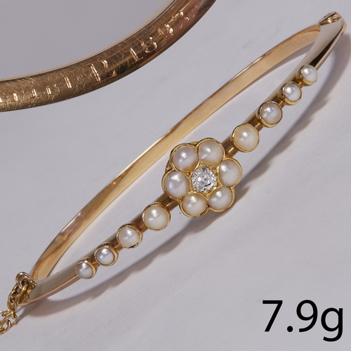 32 - ANTIQUE VICTORIAN PEARL AND DIAMOND HINGED BANGLE,
7.9 grams, testing 14 ct. gold. 
Bright and livel... 