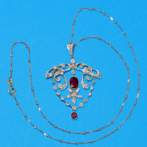 44 - BEAUTIFUL BELLE EPOQUE RUBY AND DIAMOND PENDANT/BROOCH NECKLACE.
11.5 grams
rubies are rich and vibr... 