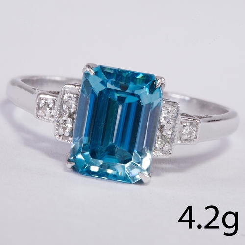 51 - ZIRCON AND DIAMOND RING,
4.2 grams, testing 14 ct. gold.
Vibrant blue zircon of approx. 4.13 ct.
Dia... 