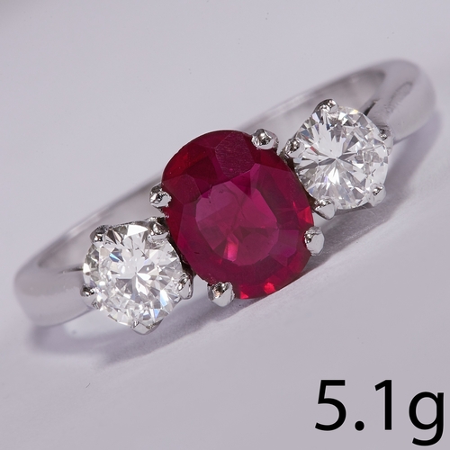 25 - RUBY AND DIAMOND 3-STONE RING,
5.1 grams.
Gemstones totalling approx. 1.58 ct.
Vibrant ruby of appro... 