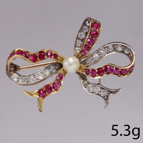 70 - RUBY, PEARL AND DIAMOND BOW BROOCH.
5.3 grams, testing 18 ct. gold.
Set with rich vibrant rubies.
Br... 