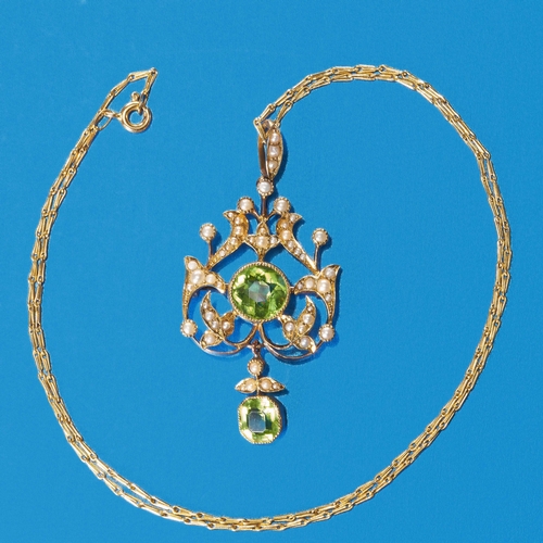 36 - VICTORIAN PERIDOT AND PEARL PENDANT NECKLACE,
9.3 grams, 15 ct. gold pendant. 
Rich and vibrant peri... 