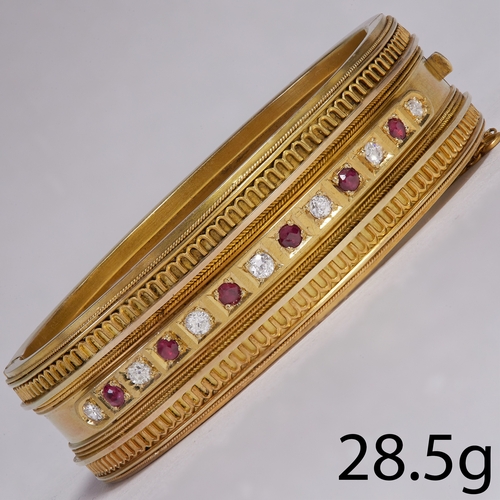 1 - VICTORIAN RUBY AND DIAMOND ETRUSCAN REVIVAL BANGLE,
28.5 grams, high carat gold 
Vibrant rubies with... 