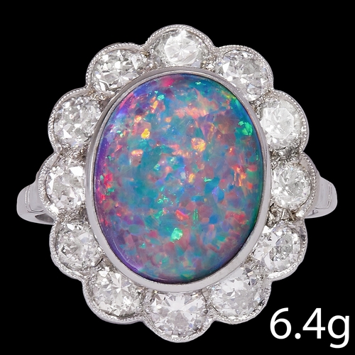 31 - FINE BLACK OPAL AND DIAMOND CLUSTER RING,
6.3 grams, high carat gold.
Fine black opal with good play... 