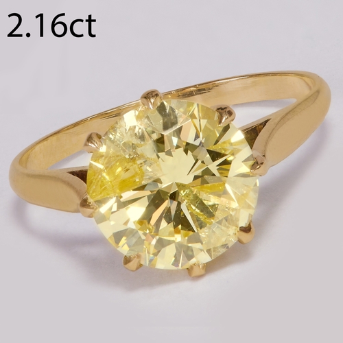 46 - FANCY YELLOW DIAMOND SOLITAIRE RING,
2.8 grams. High carat gold.
The diamond of approx. 2.16 ct.
Siz... 