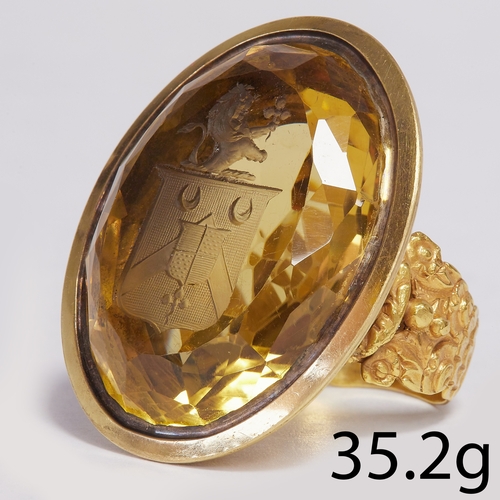 141 - IMPORTANT LARGE VICTORIAN CITRINE INTAGLIO BISHOPS RING, 
35.2 grams, testing 18 ct. gold.
large ova... 