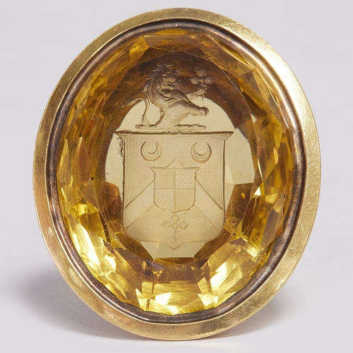 141 - IMPORTANT LARGE VICTORIAN CITRINE INTAGLIO BISHOPS RING, 
35.2 grams, testing 18 ct. gold.
large ova... 