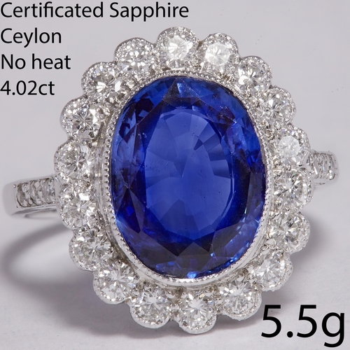 172 - CERTIFICATED CEYLON NO HEAT SAPPHIRE AND DIAMOND CLUSTER RING,
5.5 grams, Platinum
Rich and vibrant ... 