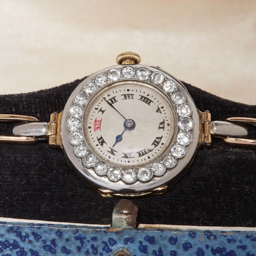 188 - DIAMOND WRIST WATCH.
24.8 grams. High carat gold.
The silver colored dial with Roman numerals. Manua... 