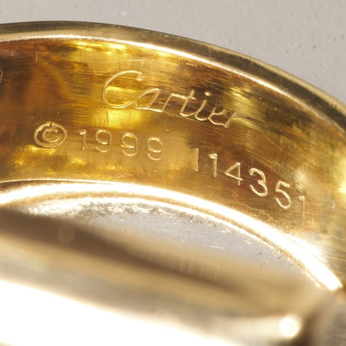 211 - CARTIER, DOMED SQUARE RING,
19.3 grams, 18 ct. gold.
Signed Cartier and numbered.
Dated 1999.
Size M... 