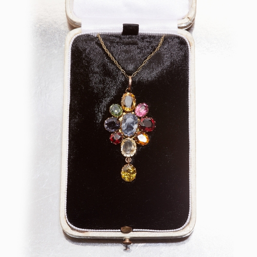 144 - MULTI GEMSTONE DROP PENDANT, The pendant set with multi gemstones including a blue sapphire to the c... 