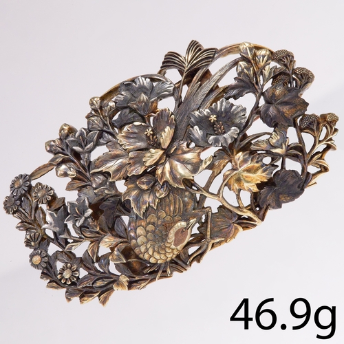 74 - A BEAUTIFUL DECORATIVE JAPANESE SHAKUDO BROOCH.
46.9 grams, Tested high carat gold and silver.
Width... 