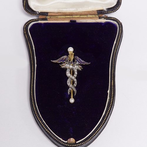 199 - FINE ANTIQUE DIAMOND AND ENAMEL CADUCEUS BROOCH,
4.3 grams, High carat gold.
Both snakes fully set w... 