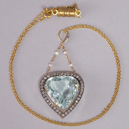 89 - FINE ANTIQUE AQUAMARINE AND DIAMOND HEART PENDANT,
13.9 grams.
Large heart shaped aquamarine of appr... 