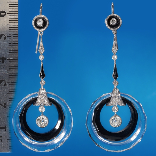 103 - FINE PAIR OF ART-DECO ROCK CRYSTAL ONYX AND DIAMOND DROP EARRINGS,
10.7 grams.
Finely carved rock cr... 