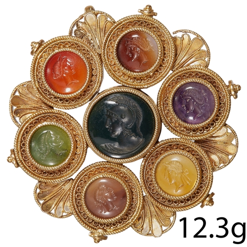 114 - FINE AND RARE VICTORIAN HARD STONE 7 INTAGLIO BROOCH/PENDANT
12.3 grams, testing 18 ct. gold.
7 carv... 