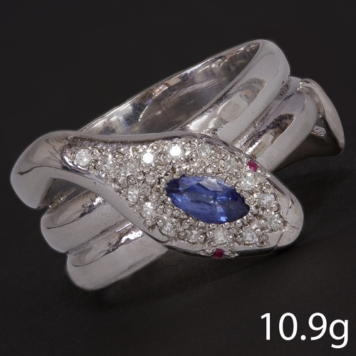 63 - TANZANITE DIAMOND AND RUBY SNAKE RING,
10.9 grams.
Diamonds bright and lively.
Size V.