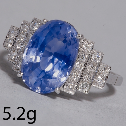 75 - SAPPHIRE AND DIAMOND RING,
5.2 grams, high carat gold.
Vibrant sapphire of approx. 5.45 ct.
Diamonds... 