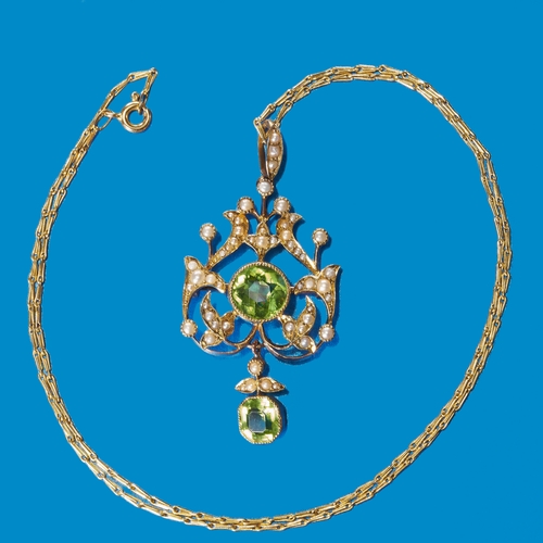 105 - VICTORIAN PERIDOT AND PEARL PENDANT NECKLACE,
9.3 grams, 15 ct. gold pendant. 
Rich and vibrant peri... 