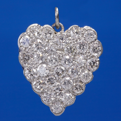 124 - FINE DIAMOND HEART PENDANT,
2.8 grams high carat gold 
locket back 
bright lively diamonds, in our o... 