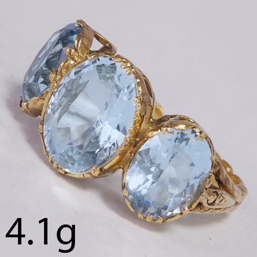 128 - AQUAMARINE 3 STONE RING,
4.1 grams, high carat gold.
Vibrant aquamarines, totalling approx. 6 ct.
Si... 