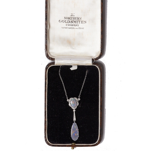 131 - BELLE EPOQUE BLACK OPAL AND DIAMOND PENDANT NECKLACE,
4.8 grams. High carat gold.
Black opals with g... 