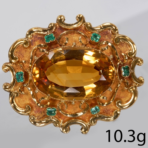 137 - ANTIQUE CITRINE AND EMERALD BROOCH,
10.3 grams. High carat gold.
Large vibrant citrine of approx. 21... 