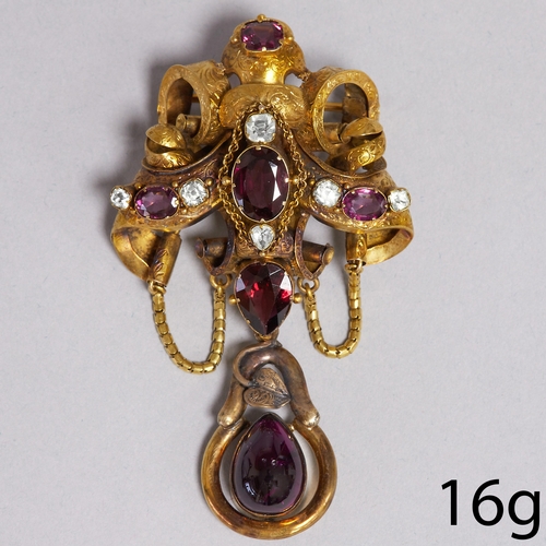 138 - LARGE VICTORIAN GARNET AND CRYSOBERYL BROOCH,
16 grams, High carat gold.
Rich and vibrant garnets.
L... 