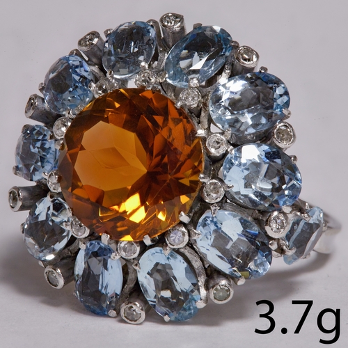 142 - LARGE CITRINE AQUAMARINE AND DIAMOND RING,
3.7 grams, High carat gold.
Large vibrant citrine.
Vibran... 