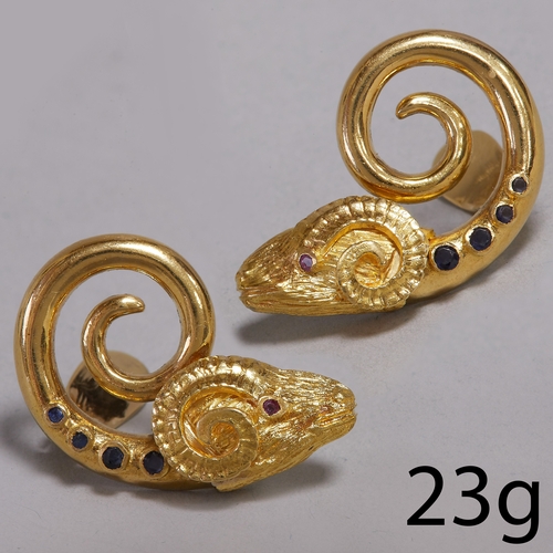 148 - ILIAS LALAOUNIS, SAPPHIRE AND RUBY RAMS HEAD EARRINGS,
23 grams, 18 ct. gold.
Vibrant sapphires and ... 