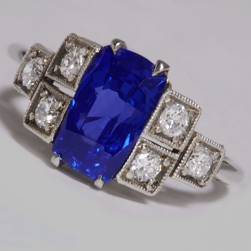 15 - ART-DECO SAPPHIRE AND DIAMOND RING,
2.8 grams, testing platinum.
Vibrant blue sapphire of approx. 3.... 