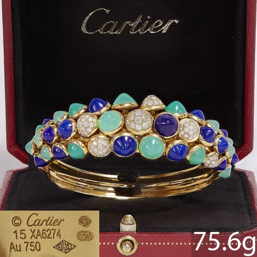 169 - CARTIER, 'PARIS NOUVELLE VAGUE' RARE DIAMOND, LAPIS LAZULI AND CHRYSOPRASE BANGLE, 
18 ct. gold.
Dia... 