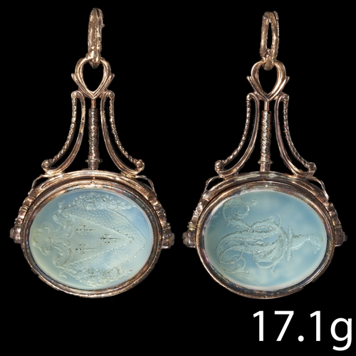 182 - ANTIQUE SWIVEL GOLD FOB SEAL,
17.1 grams.
One side of the intaglio with a carved family crest.
The o... 