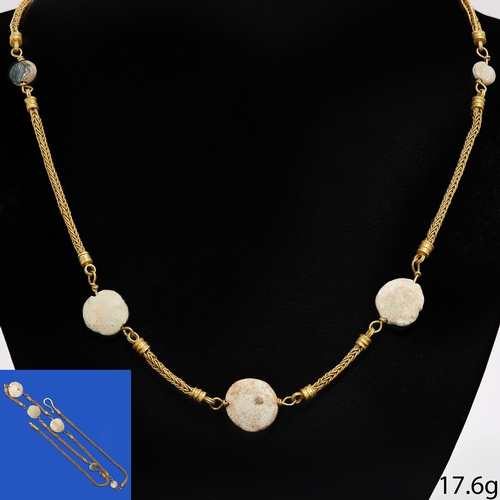 188 - ANCIENT NECKLACE WITH STONES.
17.6 grams, High carat gold.
The necklace of fine link design.
Some st... 